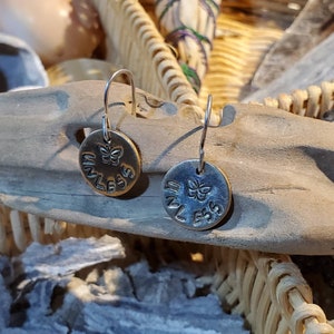 Brass Unless Earrings