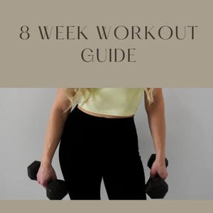 May include: A fitness guide with the text "8 Week Workout Guide" and "Embody Health & Fitness Coaching." The image shows a person holding two black dumbbells. The guide promises an 8-week strength program to build muscle.