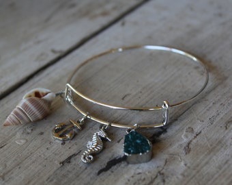 Seashell, Anchor, Seahorse and a Sea Blue Gemstone on a Bangle Bracelet