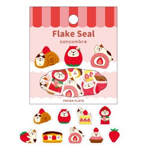 May include: A sheet of flake seals with a strawberry and cat theme. The package has the words "Flake Seal concombre" and "PAPIER PLATZ". The seals feature illustrations of cats, strawberries, and pastries in shades of red, pink, brown, and white.