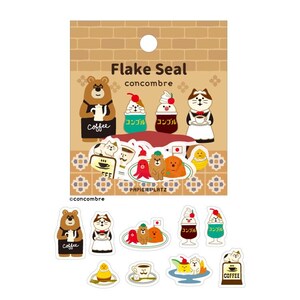 May include: A sheet of decorative stickers featuring various cartoon characters, including a bear, cat, and dogs, with coffee and dessert themes. The stickers are in a variety of colors, including brown, white, and red. The text "Flake Seal" and "concombre" are visible.
