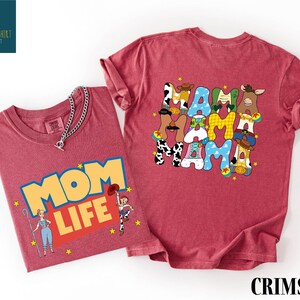 two t-shirts, one with a colorful graphic and the other with a text graphic.