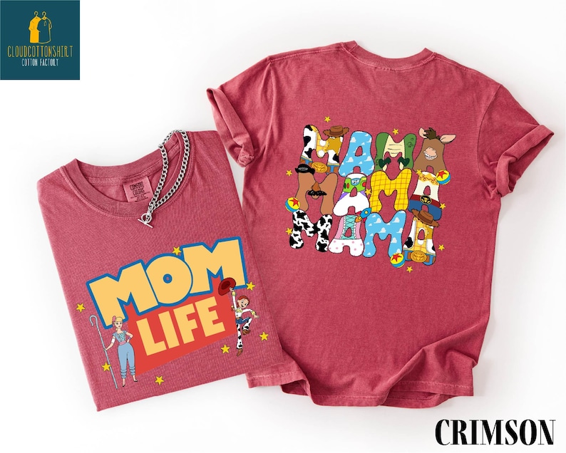 two t-shirts, one with a colorful graphic and the other with a text graphic.