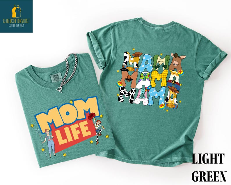 two t-shirts with different designs. The t-shirt on the left has a colorful graphic with a woman and a cow, while the t-shirt on the right has a large graphic with the word "MOM" and various cartoon animal characters.