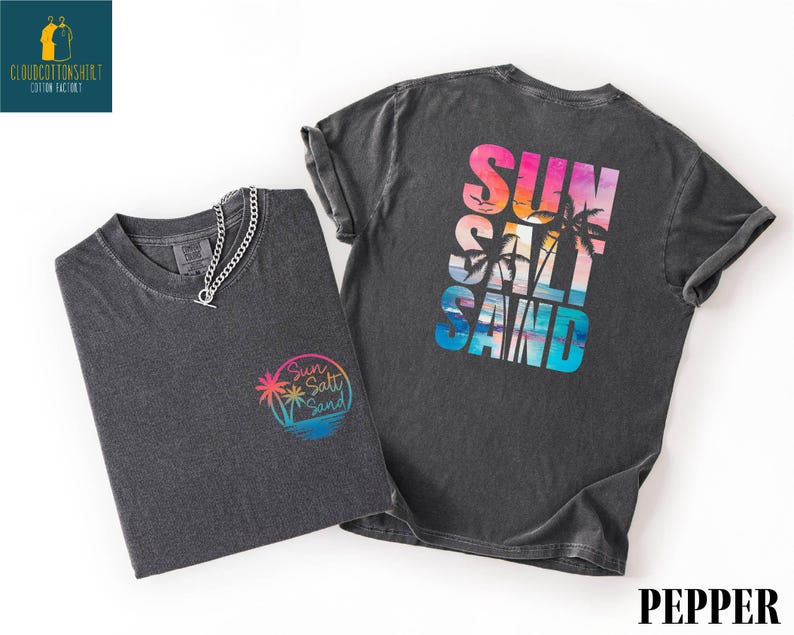 a gray t-shirt with a colorful graphic design on the back, along with a smaller gray t-shirt on the left side.