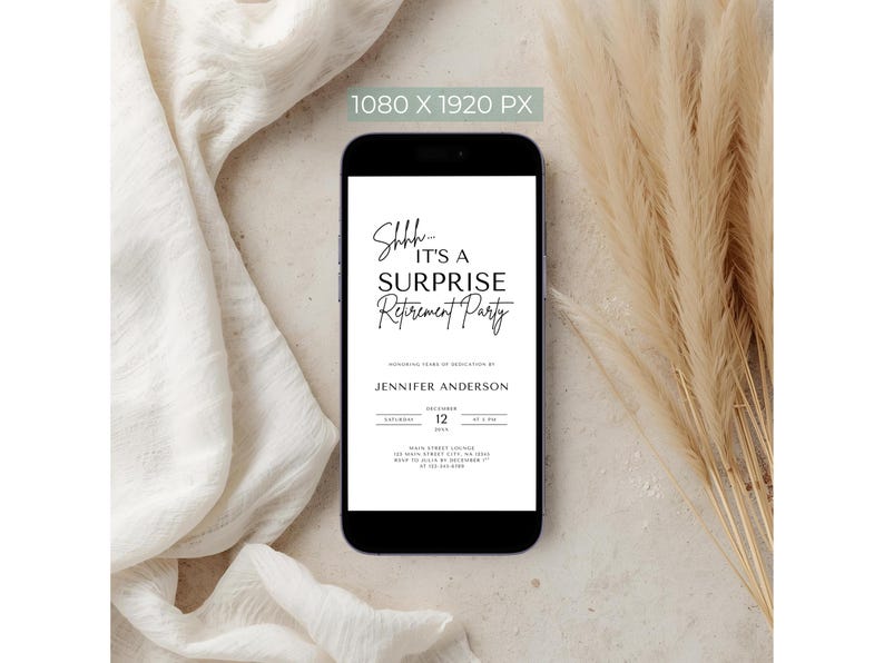 May include: A smartphone displays a digital invitation for a surprise retirement party. The invitation features elegant black text on a white background, with details including the honoree's name, date, and venue. The phone rests on a neutral-toned surface with decorative elements.