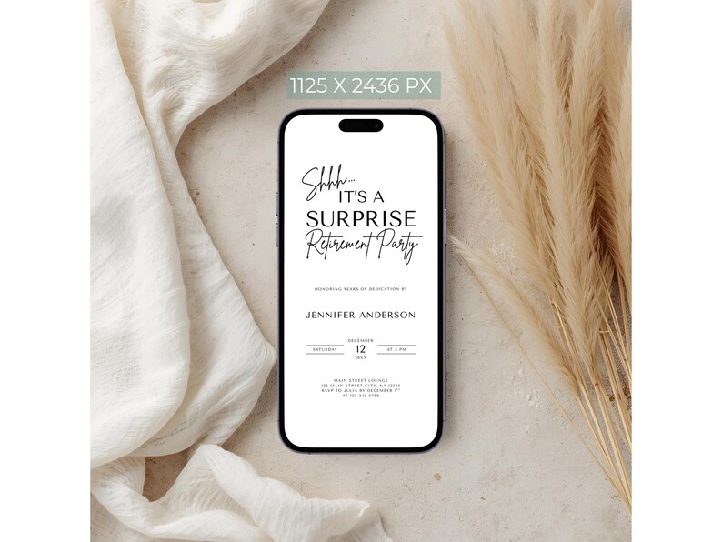 May include: A smartphone displays a digital invitation for a surprise retirement party. The invitation features elegant black script on a white background, with details including the date, time, and location. The phone rests on a neutral-toned surface with fabric and decorative plants.