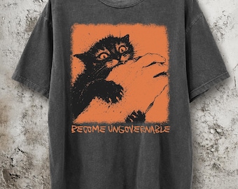 Camiseta "Conviértete en un gato ingobernable", camiseta divertida de gato mordiendo una mano, camiseta gráfica vintage, Comfort Colors, regalo divertido para amantes de los gatos, regalo de camiseta con meme extraño