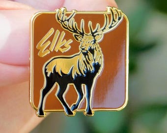 Staande reversspeld eland