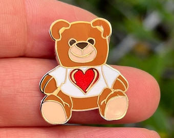 Teddyberen met hartreversspeldjes