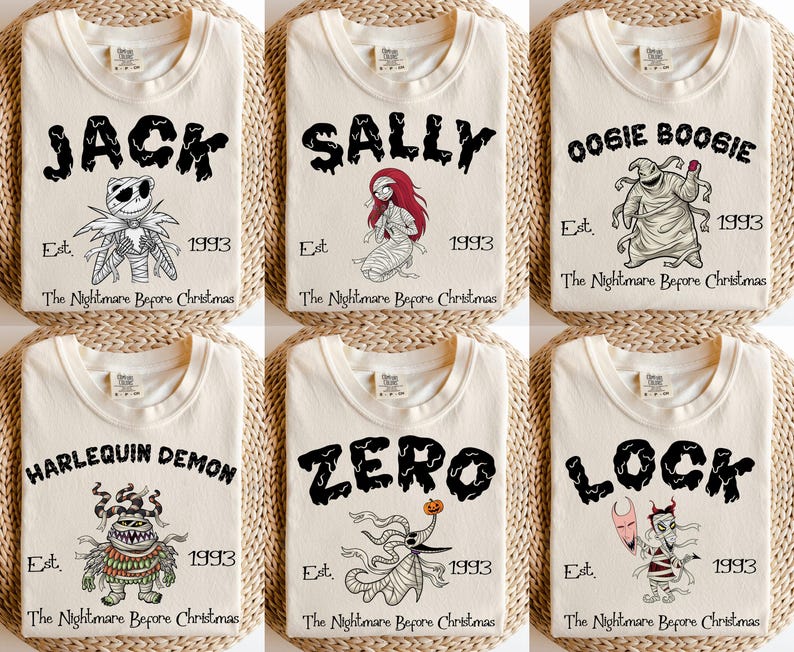 May include: Cream-colored t-shirts featuring characters from "The Nightmare Before Christmas." Each shirt displays a character's name in black, along with an illustration, the year "1993," and the phrase "The Nightmare Before Christmas."
