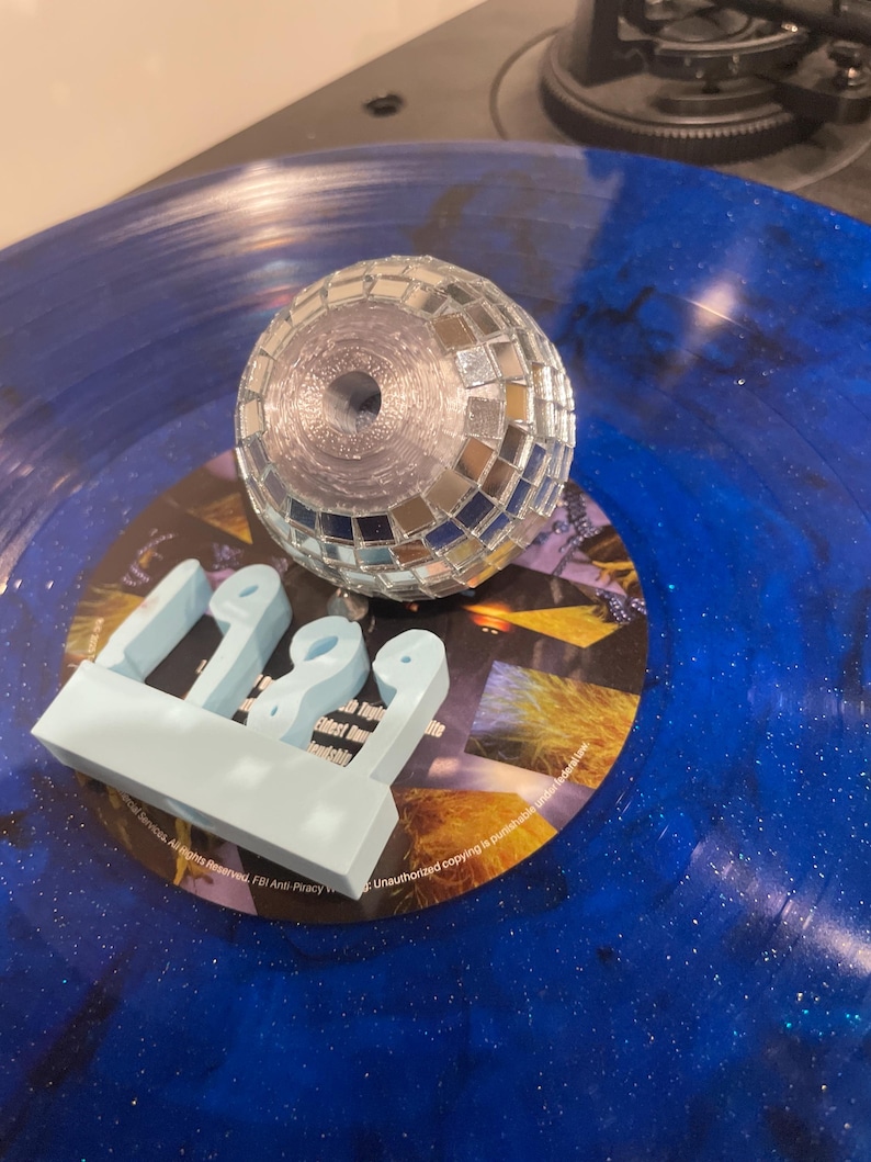 shows hold on bottom of mirrorball