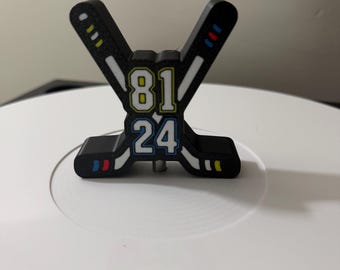 Heated hockey stick record topper