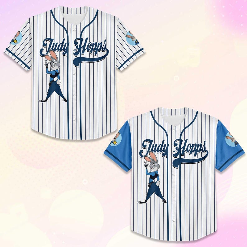 May include: Two white baseball jerseys with blue pinstripes. Each jersey features the name "Judy Hopps" in navy blue script and an illustration of a cartoon rabbit. One jersey has blue sleeves.