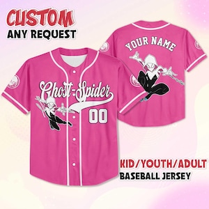 May include: Pink baseball jersey with white trim, featuring "Ghost-Spider" and the number "00" on the front. The back of the jersey has a "Your Name" section and a graphic of Ghost-Spider. The jersey is available in kid, youth, and adult sizes.