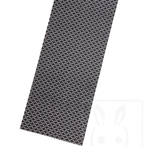 May include: Black fabric with a white repeating pattern of a stylized S shape.