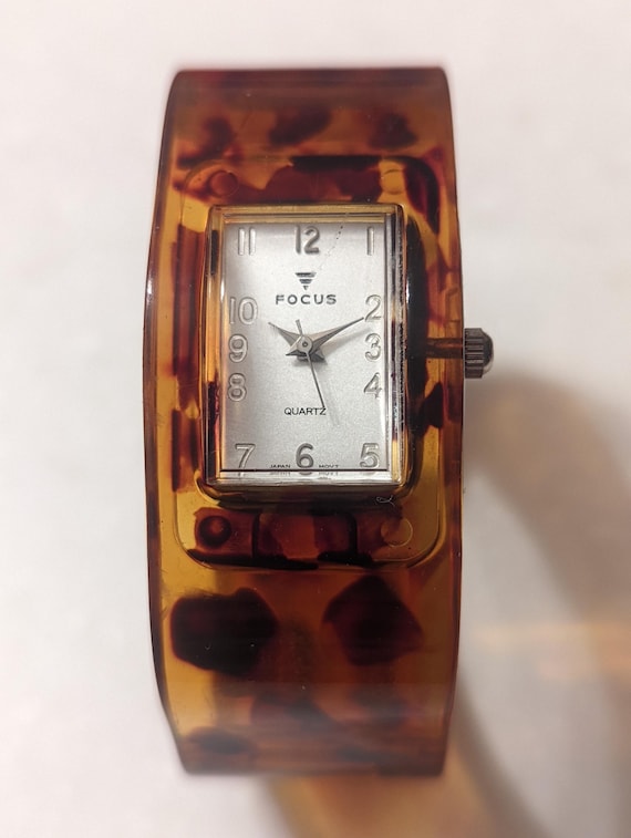 Women's hinged tortoise-shell-pattern cuff watch … - image 1