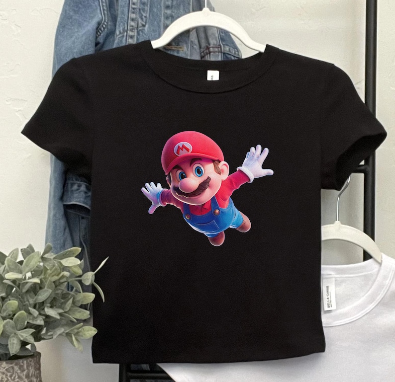 May include: A set of three ceramic mugs with a speckled, matte finish. The mugs are in shades of cream, light gray, and dark gray. Each mug has a simple, minimalist design, perfect for coffee or tea.