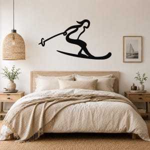 Metal Wall Art Lady Skiing: gestroomlijnd silhouet skiër - gepoedercoat staal, binnen en buiten, weerbestendig bergdecor