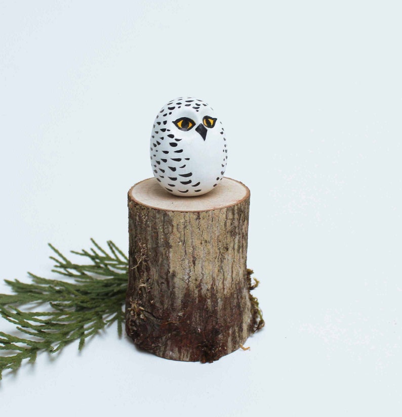 Snowy Owl and tree stump image 2