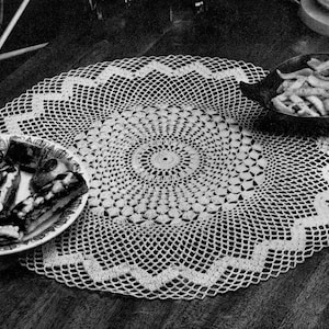 May include: A set of three ceramic mugs with a speckled, matte finish. The mugs are in shades of cream, light gray, and dark gray. Each mug has a simple, minimalist design and a rounded handle.