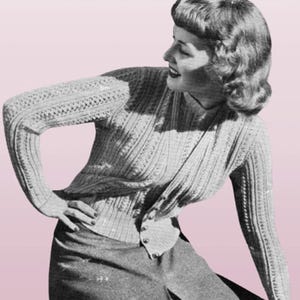 May include: A set of three ceramic mugs with a speckled, cream-colored glaze. Each mug features a different hand-painted floral design in shades of blue, green, and yellow. The mugs have a simple, rounded shape and a comfortable handle.