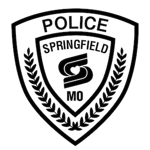 May include: Black and white Springfield, MO Police Department badge. The badge is shield-shaped with the word "POLICE" at the top. The center features the city name and a stylized "S" with a heart. Laurel branches frame the inner badge.