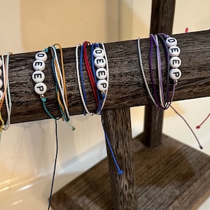 Fundraiser item: DEEP Adjustable wax coated string bracelets image 1