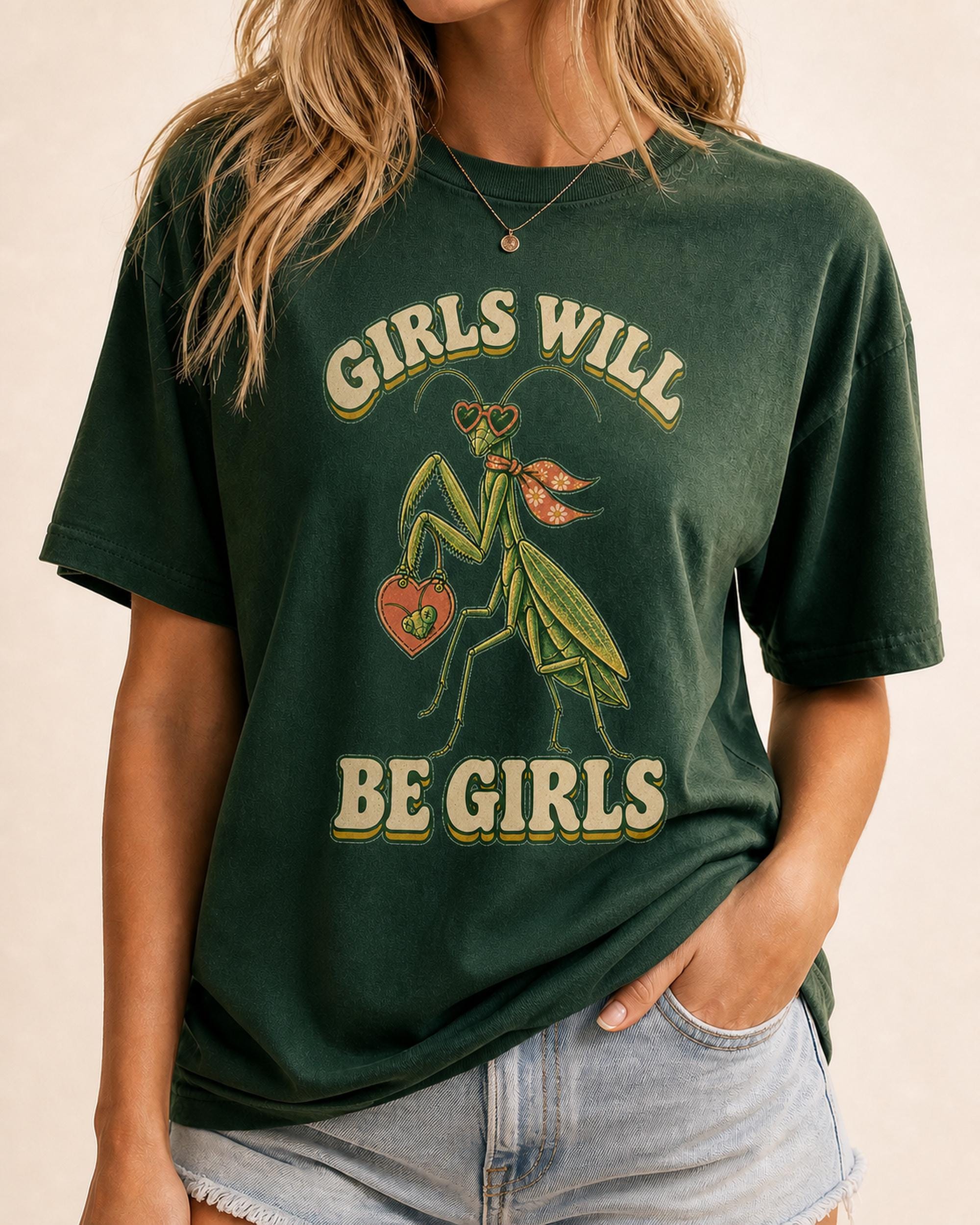 Retro Girls Will Be Girls praying mantis design printed at a natural scale on a cream T-shirt.