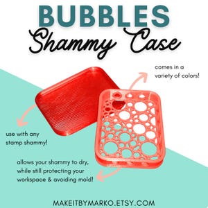 May include: A coral-colored "Bubbles Shammy Case" with a lid, designed to hold a stamp shammy. The case has a bubble-like pattern and the text "comes in a variety of colors!" and "allows your shammy to dry, while still protecting your workspace & avoiding mold!"