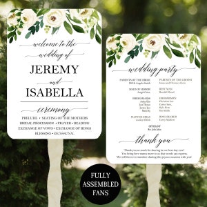 May include: Wedding ceremony and reception details printed on two white signs with green floral designs. The ceremony sign lists the order of events, including the prelude, seating of the mothers, bridal procession, prayer, reading, exchange of vows, exchange of rings, blessing, and recessional. The reception sign lists the wedding party, including the parents of the bride and groom, maid of honor, bridesmaids, groomsmen, flower girls, ring bearer, and officiant. The signs are fully assembled and ready to be used at a wedding.