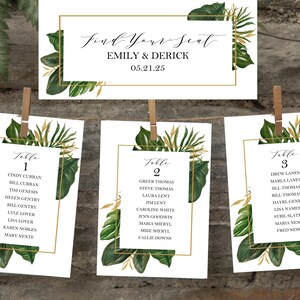 May include: Three table cards with tropical leaf designs and gold accents. The cards are numbered 1, 2, and 3. Each card lists names for a wedding seating chart.