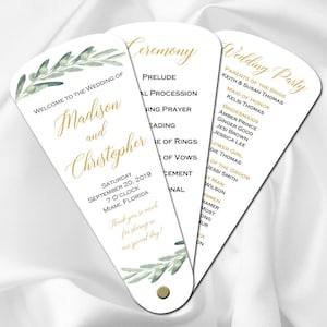 May include: A white wedding program fan with green and gold floral designs. The program includes the wedding ceremony schedule and the wedding party names. The text reads "Welcome to the wedding of Madison and Christopher" and "Saturday, September 20, 2019, 7 o'clock, Miami, Florida".