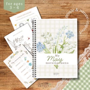 Könnte beinhalten: Ein spiralgebundenes Notizbuch "My May Morning Menu" mit floralem Design, zusammen mit Aktivitätsblättern für Kinder im Alter von 3-6 Jahren. Das Cover zeigt weiße Maiglöckchen und blaue Blumen auf kariertem Hintergrund. Enthält Mal- und Nachverfolgungsaktivitäten.