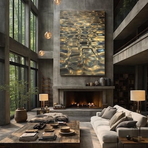 May include: A modern living room with a large painting of water ripples above a fireplace. The room features a wooden coffee table, a light-colored sofa, and large windows. Three pendant lights hang from the high ceiling.