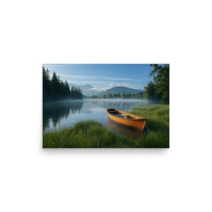 May include: A scenic landscape print featuring a wooden rowboat resting on the edge of a calm lake. The water reflects the surrounding trees and mountains under a blue sky. Lush green grass and a misty atmosphere add to the serene scene.