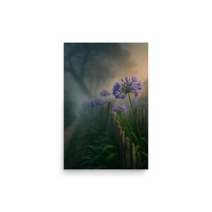 May include: A print of a serene garden scene featuring purple flowers in front of a wooden fence. The background shows a path leading into a misty forest, with soft lighting creating a tranquil atmosphere. The artwork evokes a sense of peace and natural beauty.