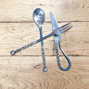 Elegance in Every Twist A Masterfully Forged Iron Cutlery Set That Embodies the Soul of Traditional Craftsmanship and Sophisticated Dining