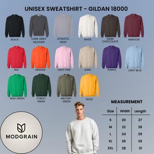 May include: A display of Gildan 18000 unisex sweatshirts in various colors, including black, white, red, and green. The image also shows a size chart with measurements in inches and a person wearing a white sweatshirt. The Modgrain logo is visible.