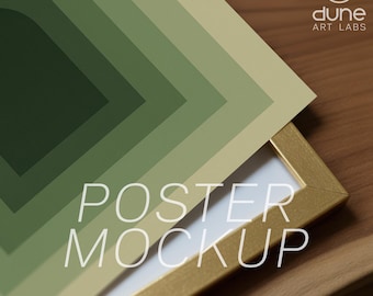 May include: A poster mockup featuring a geometric design in shades of green. The poster is displayed in a gold frame, with the text "POSTER MOCKUP" visible. The image also includes the text "PSD CLOSEUP" and the Dune Art Labs logo.