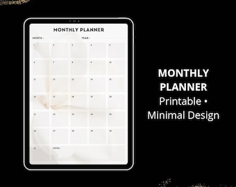 May include: A digital monthly planner with a minimalist design. The planner is displayed on a tablet with a white screen, featuring a calendar grid. The text "MONTHLY PLANNER" and "Printable • Minimal Design" are also visible.