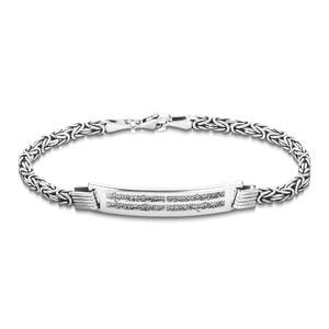 May include: A silver bracelet with a woven chain design and a rectangular center plate. The plate features engraved text. The bracelet is made of a shiny, metallic material and has a clasp closure.