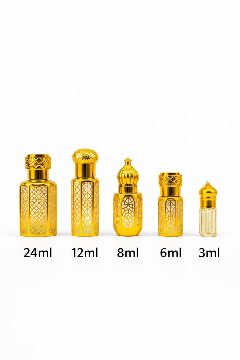 May include: Five gold-colored perfume bottles of varying sizes, ranging from 3ml to 24ml, are displayed against a white background. Each bottle has a decorative, ornate design and a matching cap. The sizes are labeled on the bottom.