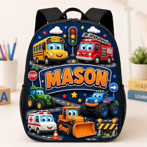 May include: A black backpack featuring a dark blue front panel with a cartoon graphic of a yellow school bus, red fire truck, green tractor, blue monster truck, white ambulance, and orange bulldozer. The name MASON is printed in large orange letters.