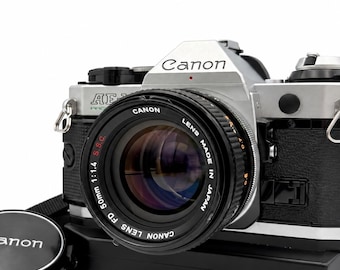 Canon AE-1 35mm SLR Film Camera with Moter Drive FD 50mm f/1.4 S.S.C Lens [Mint-] Tested from Japan