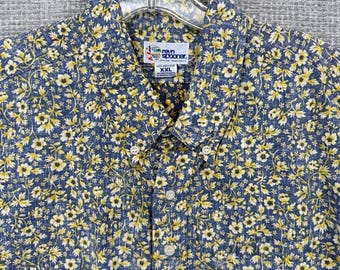 Camisa vintage de los 90 de Reyn Spooner, talla 2XL, azul y amarillo, con estampado floral de margaritas hawaianas, tipo popover.