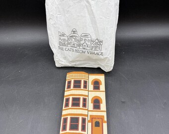 Casa de huéspedes Kalorama Village, serie III, 1985, firmada por un felino.