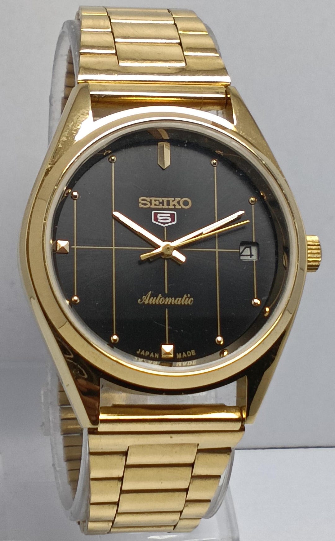 SEIKO5自動巻き 腕時計 黒文字盤 日付表示 ヴィンテージ セイコー5 自動巻き腕時計：ブラック文字盤、日付表示