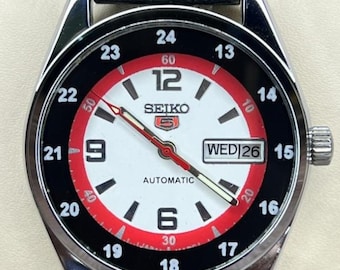 Reloj de pulsera Seiko 5 automático vintage con esfera blanca y roja, 36 mm, fabricado en Japón.