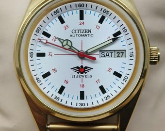 white dial wrist watch,citizen vintage watch,day date,japan made